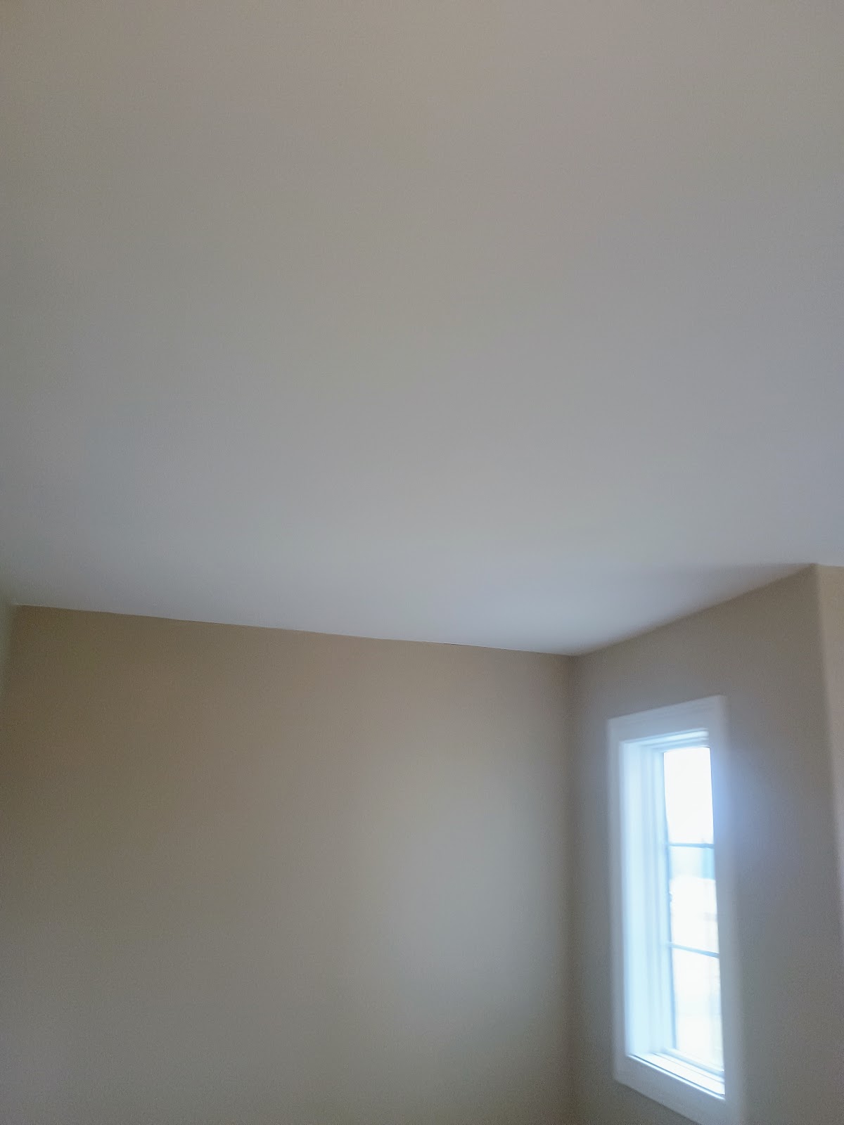 Bedroom corner window — drywall and painting by Smooth Finish, Fort Wayne