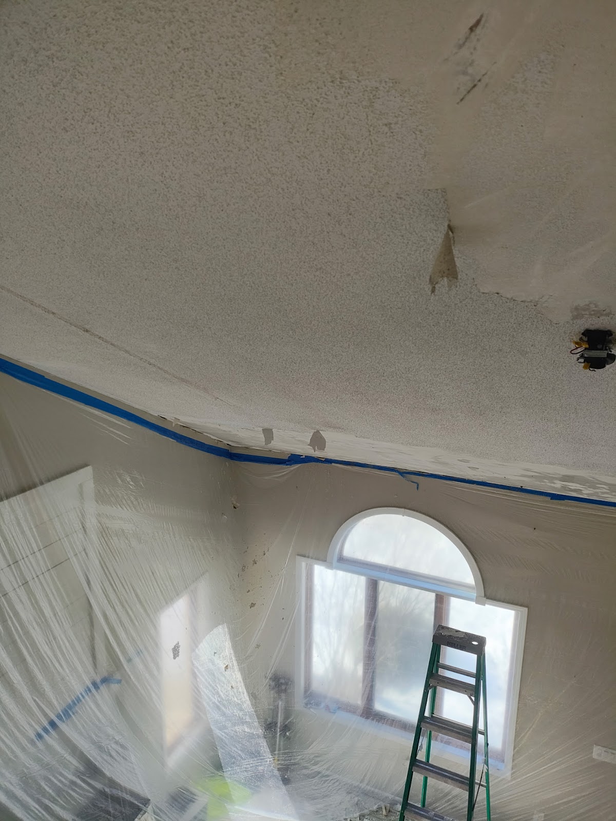 Popcorn ceiling removal and refinishing